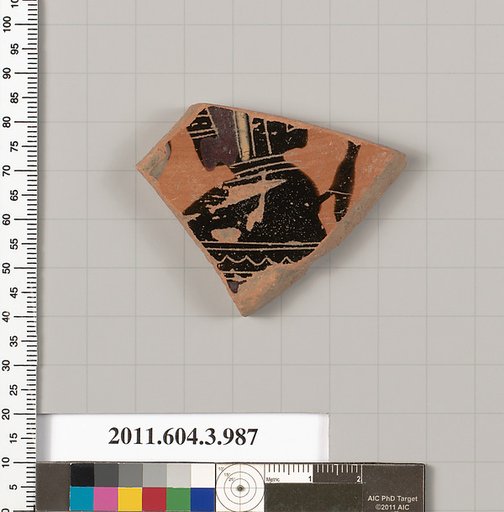 Terracotta fragment of a lekanis lid (covered dish)