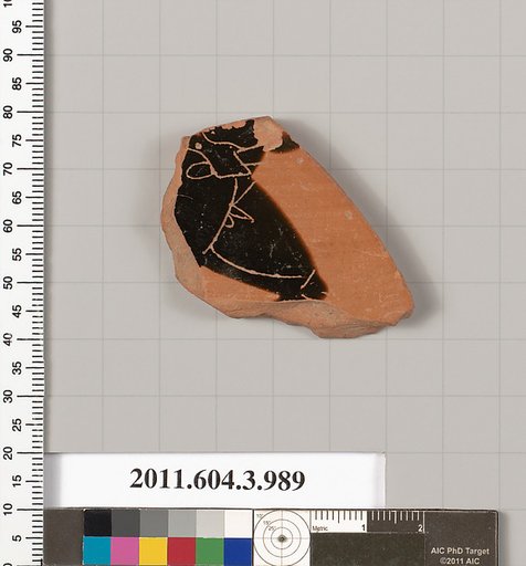 Terracotta fragment of a lekanis lid (covered dish)