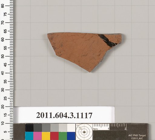 Terracotta fragment of a mastoid (drinking cup with narrow base) or a kyathos (cup-shaped ladle)