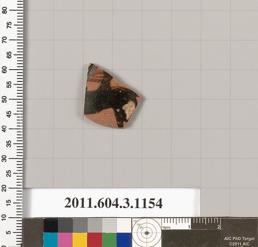 Terracotta fragment of a mastoid (drinking cup with narrow base) or a kyathos (cup-shaped ladle)