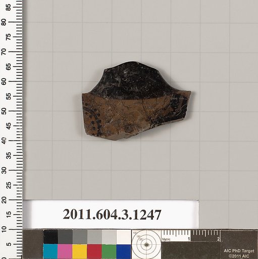 Terracotta fragment of a kyathos (cup-shaped ladle)