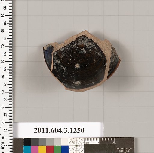 Terracotta fragment of a kyathos (cup-shaped ladle)