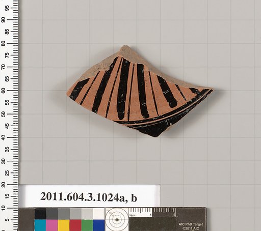 Terracotta fragment of a lekanis lid (covered dish)?