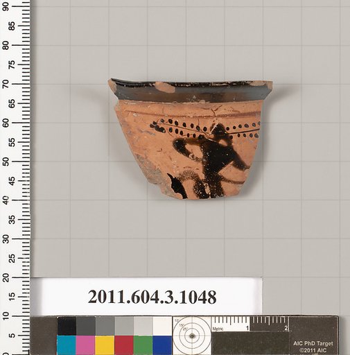 Terracotta fragment of a mastoid (drinking cup with narrow base)