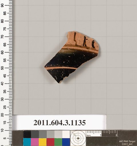 Terracotta fragment of a mastoid (drinking cup with narrow base) or a kyathos (cup-shaped ladle)