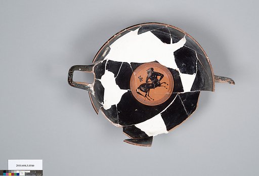 Terracotta fragment of a kylix: eye-cup (drinking cup)