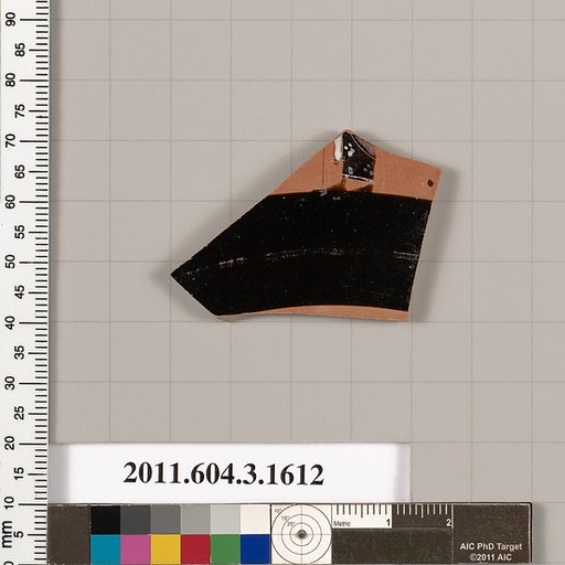 Terracotta fragment of a kylix: Band cup (drinking cup)