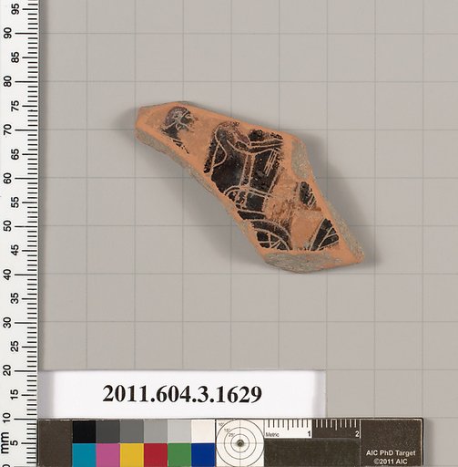Terracotta fragment of a kylix: Band cup (drinking cup)