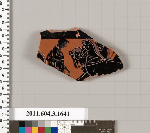 Terracotta fragment of a kylix: Band cup (drinking cup)