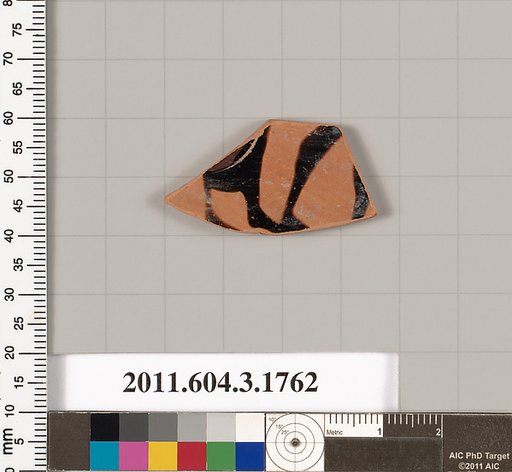 Terracotta fragment of a kylix: Band cup (drinking cup)