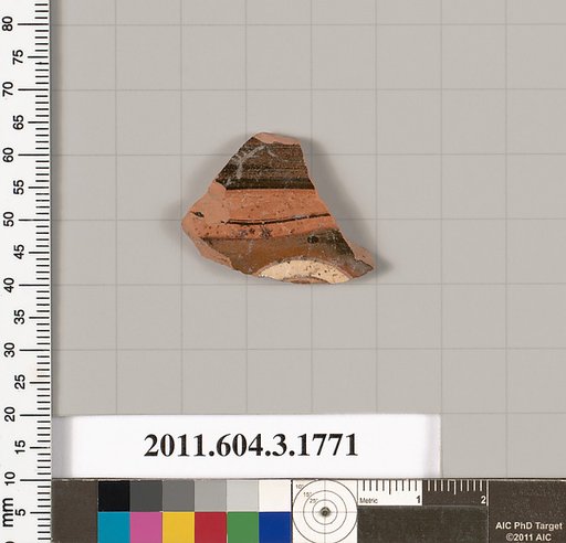 Terracotta fragment of a kylix: Band cup (drinking cup)