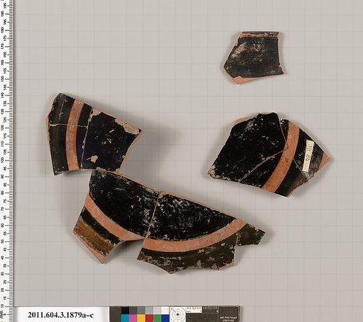 Terracotta fragments of a kylix: Band or lip cup (drinking cup)