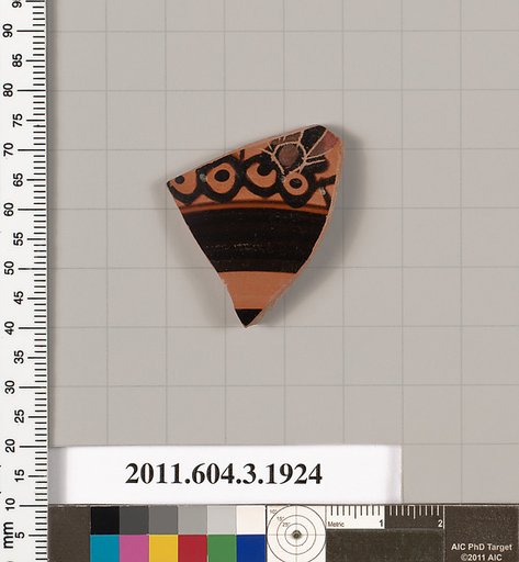 Terracotta fragment of a kylix (drinking cup) or a skyphos (deep drinking cup)?