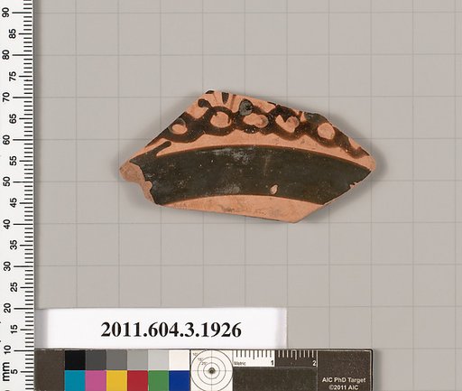 Terracotta fragment of a kylix (drinking cup) or a skyphos (deep drinking cup)?