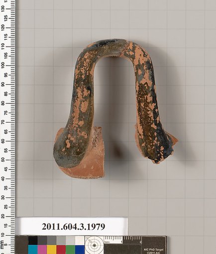 Terracotta fragment of a kylix (drinking cup)