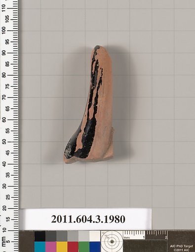 Terracotta fragment of a kylix (drinking cup)