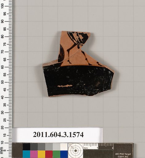 Terracotta fragment of a kylix: Band cup (drinking cup)
