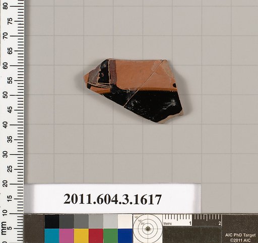 Terracotta fragment of a kylix: Band cup (drinking cup)