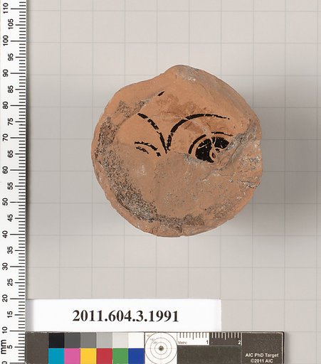 Terracotta fragment of a kylix (drinking cup)