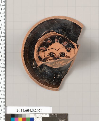 Terracotta fragment of a kylix (drinking cup)