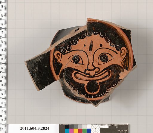 Terracotta fragment of a stemless kylix (drinking cup)