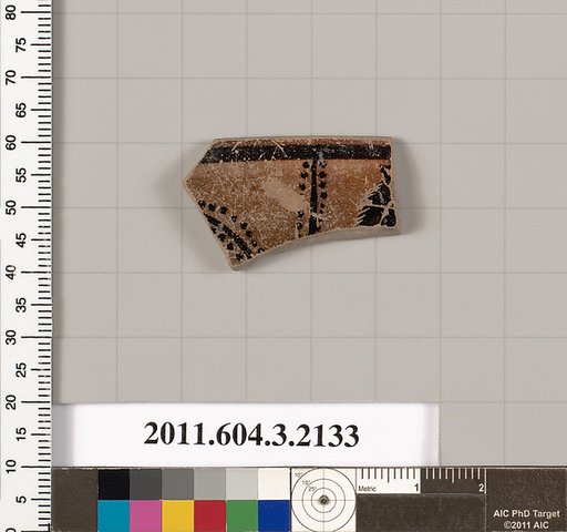 Terracotta rim fragment of a kylix (drinking cup)