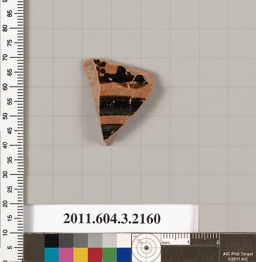 Terracotta fragment of a kylix (drinking cup)