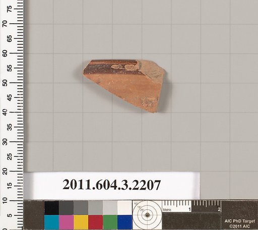 Terracotta fragment of a kylix (drinking cup)