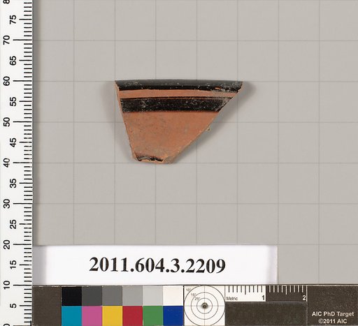 Terracotta fragment of a kylix (drinking cup)