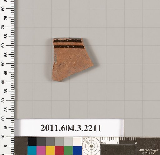 Terracotta fragment of a kylix (drinking cup)