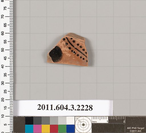 Terracotta fragment of a kylix (drinking cup)