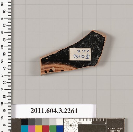 Terracotta fragment of a kylix (drinking cup)