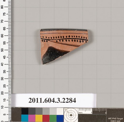 Terracotta rim fragment of a kylix: eye-cup (drinking cup)