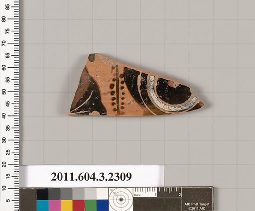Terracotta fragment of a kylix: eye-cup (drinking cup)
