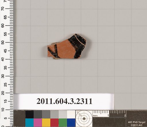 Terracotta fragment of a kylix: eye-cup (drinking cup)