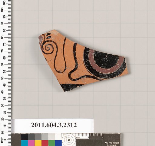 Terracotta fragment of a kylix: eye-cup (drinking cup)
