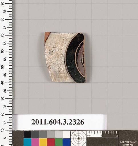 Terracotta fragment of a kylix: eye-cup (drinking cup)