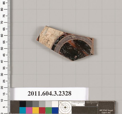 Terracotta fragment of a kylix: eye-cup (drinking cup)