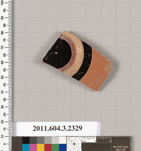 Terracotta fragment of a kylix: eye-cup (drinking cup)
