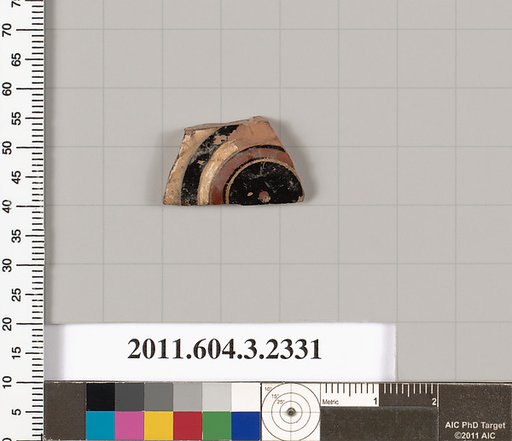 Terracotta fragment of a kylix: eye-cup (drinking cup)