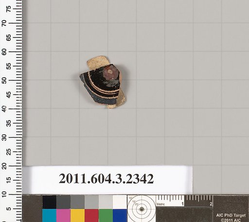 Terracotta fragment of a kylix: eye-cup (drinking cup)