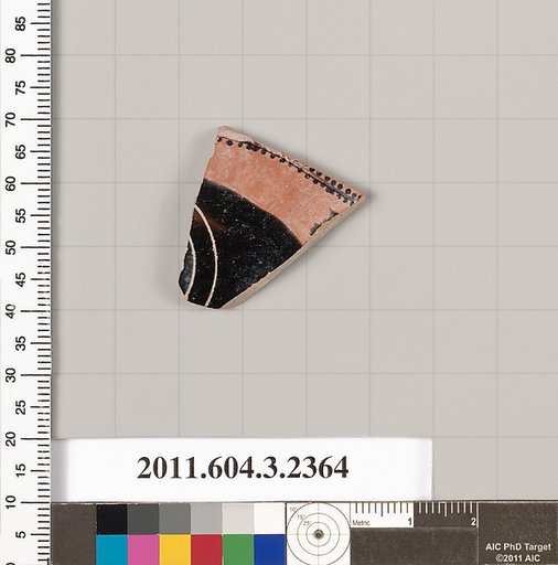 Terracotta fragment of a kylix: eye-cup (drinking cup)
