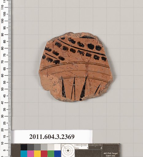 Terracotta fragment of a kylix: eye-cup (drinking cup)