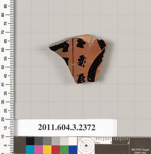 Terracotta fragment of a kylix: eye-cup (drinking cup)
