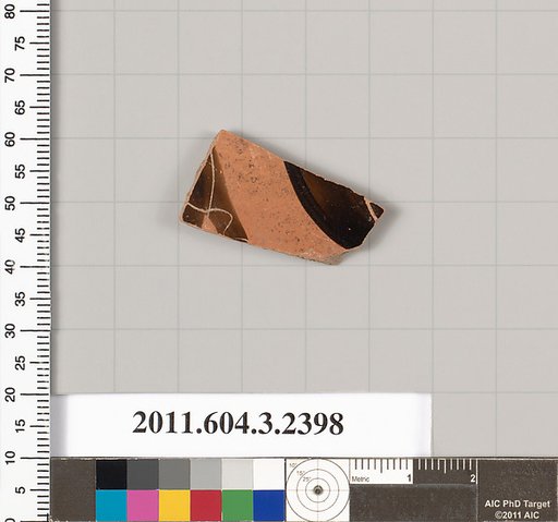 Terracotta fragment of a kylix: eye-cup (drinking cup)