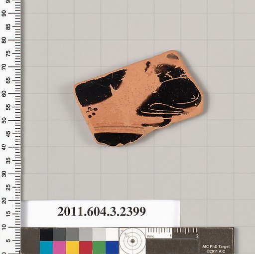 Terracotta fragment of a kylix: eye-cup (drinking cup)