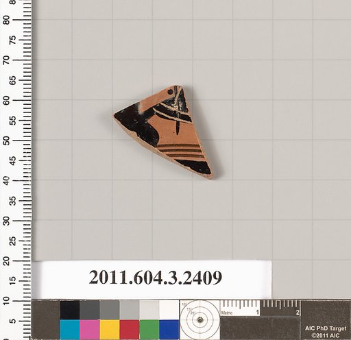 Terracotta fragment of a kylix: eye-cup (drinking cup)