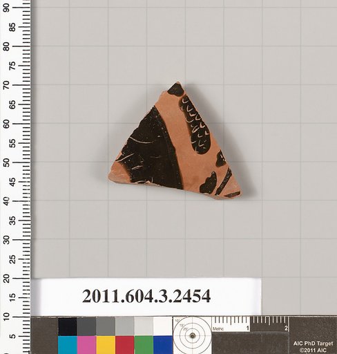 Terracotta fragment of a kylix: eye-cup (drinking cup)