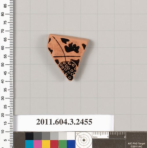 Terracotta fragment of a kylix: eye-cup (drinking cup)