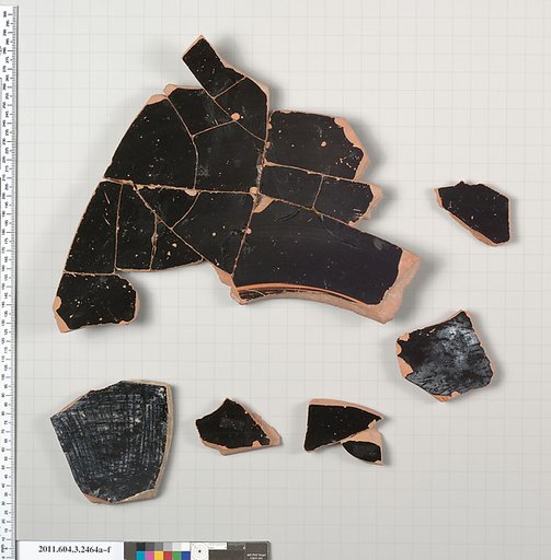 Terracotta fragments of a kylix: eye-cup (drinking cup)